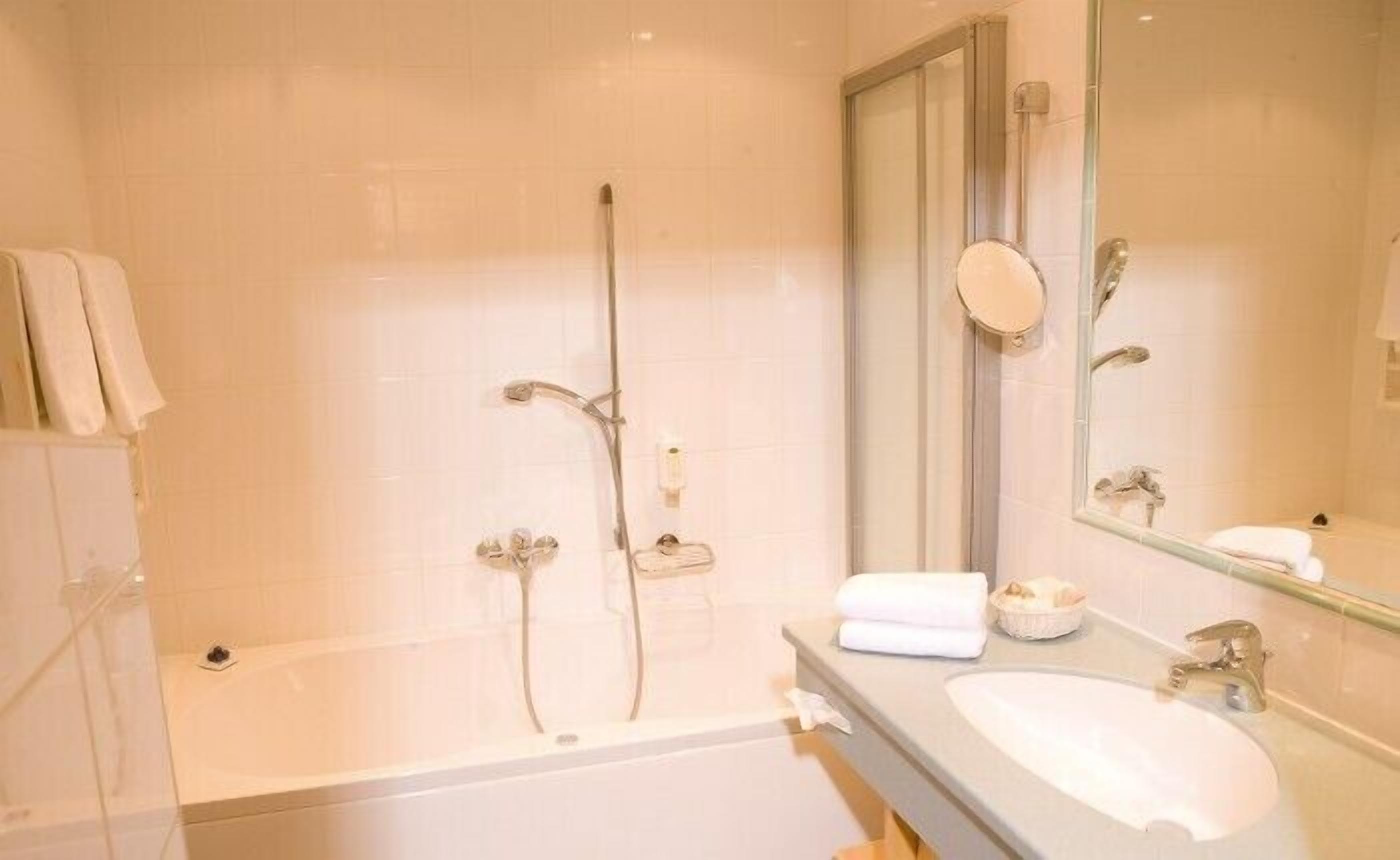 shower, hair dryer, bathrobes, towels