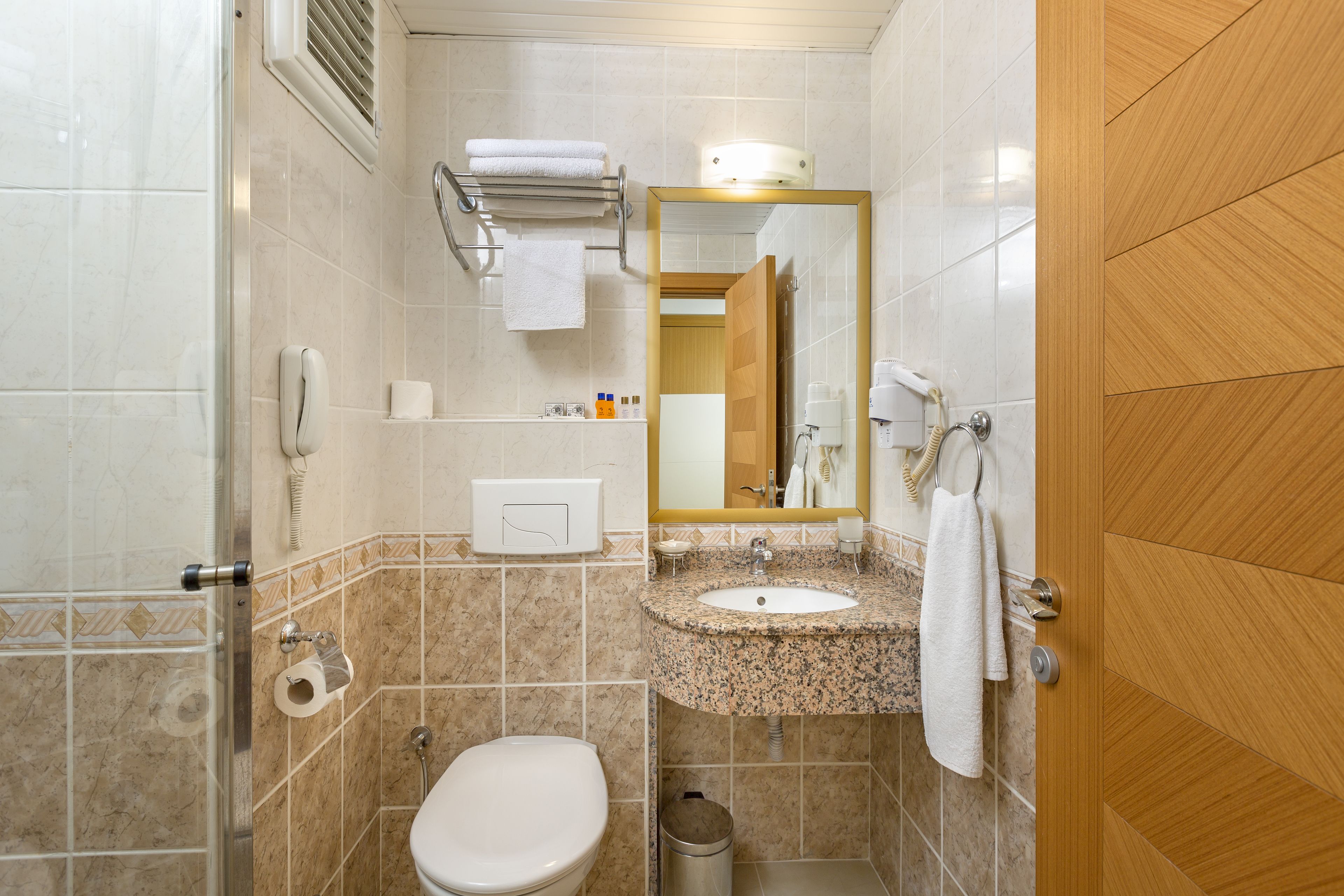 standard double or twin room | bathroom | shower, hair dryer, towels