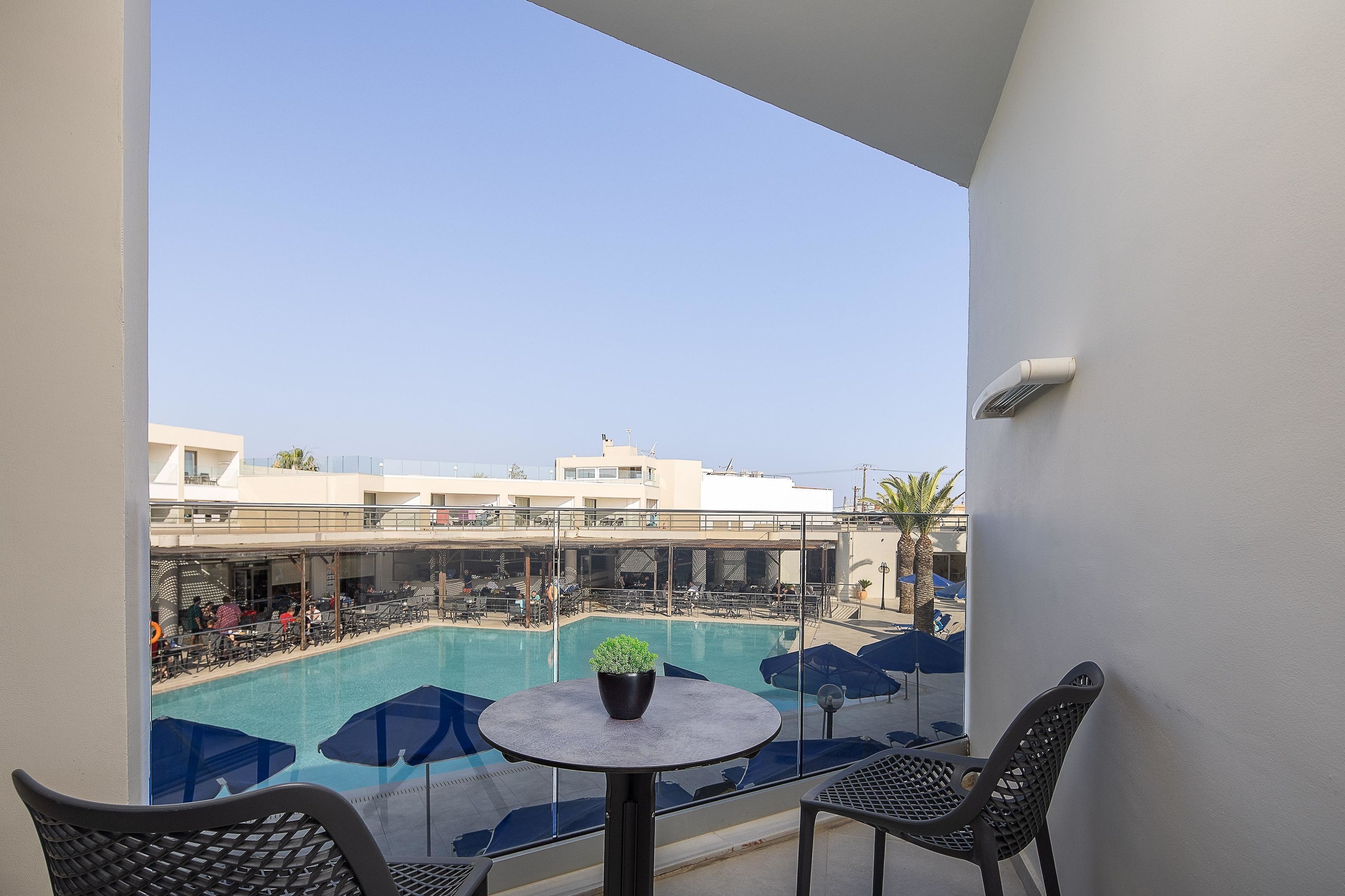 Double Room | Pool | Seasonal outdoor pool, open 9:00 AM to 7:00 PM, sun loungers