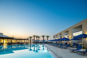 Seasonal outdoor pool, open 9:00 AM to 7:00 PM, sun loungers