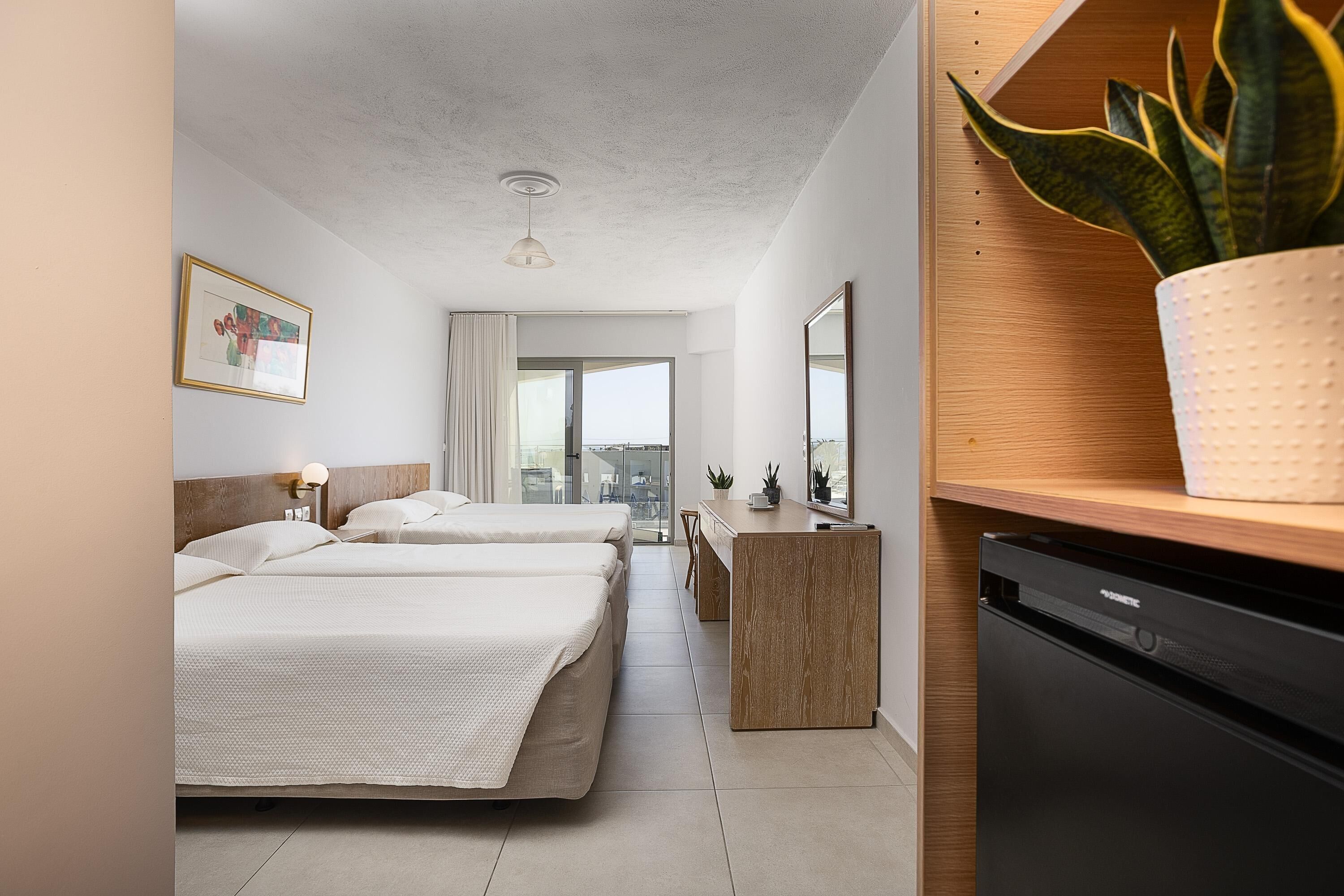 مكواة/لوح كي وملاءات أسرّة