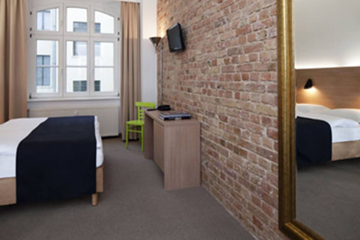 Triple Room, Private Bathroom | Hypo-allergenic bedding, in-room safe, individually decorated, desk