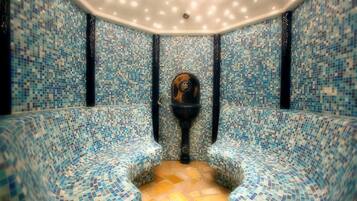 Relax in a stylish space with two seating areas and a unique mosaic tile design.
