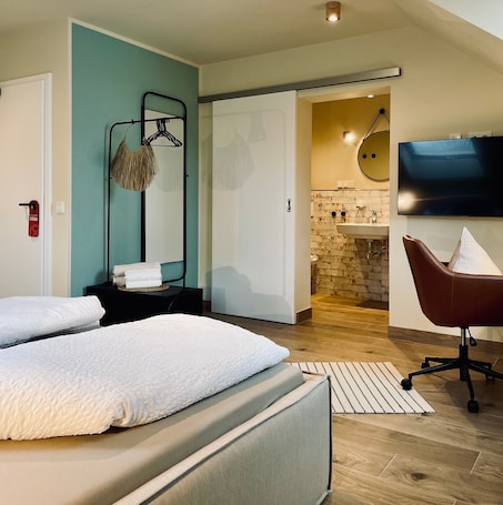 Ropa de cama de alta calidad y minibar con artículos gratuitos