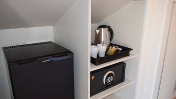 Minibar, safe på rommet, individuelt dekorert og individuelt innredet