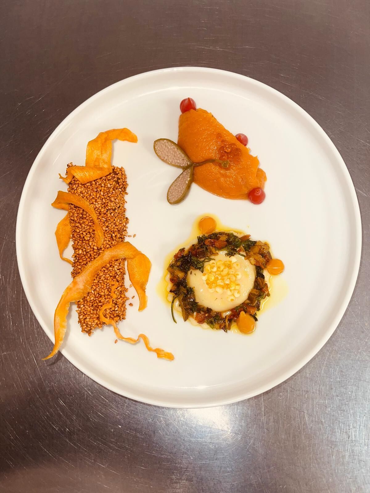 A white plate with various food items.