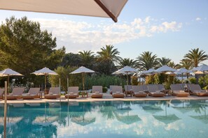 3 outdoor pools, pool umbrellas, pool loungers - Cala San Miguel Ibiza Resort, Curio Collection by Hilton (Sant Joan de Labritja)
