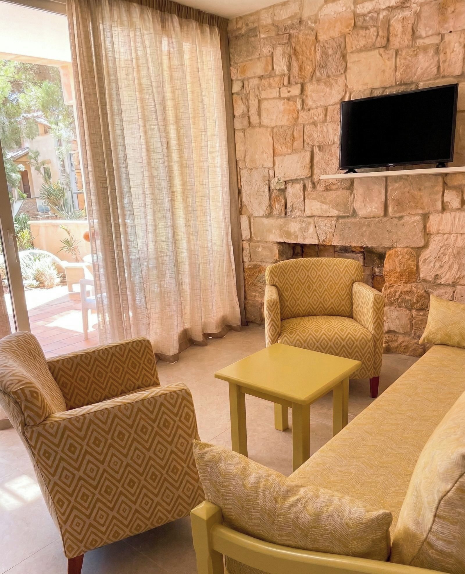 Bungalow | Living area | 15-inch TV with cable channels