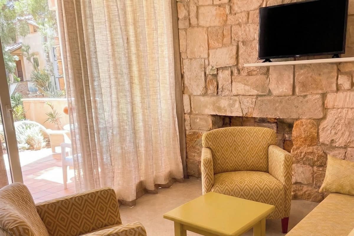 Bungalow | Living area | 15-inch TV with cable channels