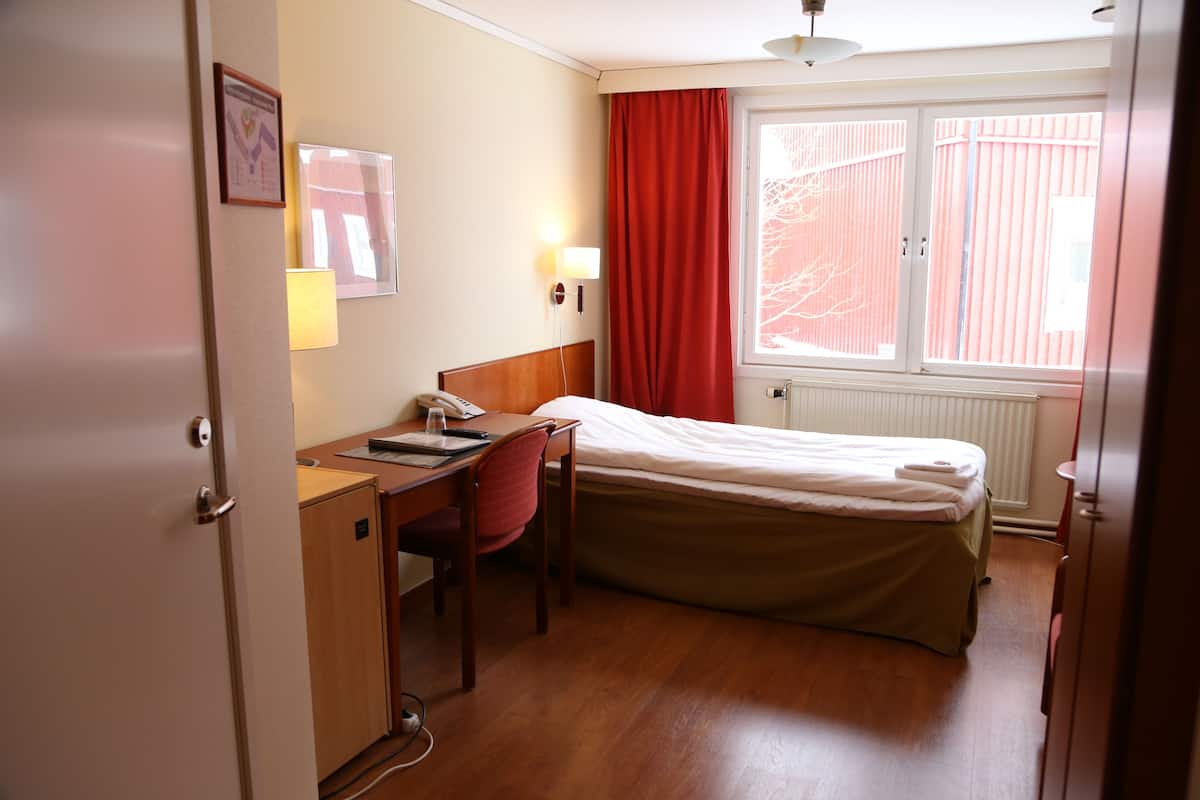 Desk, blackout curtains, free WiFi, bed sheets