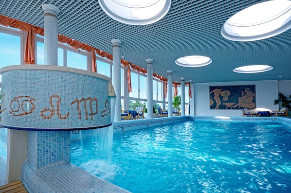 Indoor pool, outdoor pool, open 8 AM to 7:00 PM, pool umbrellas