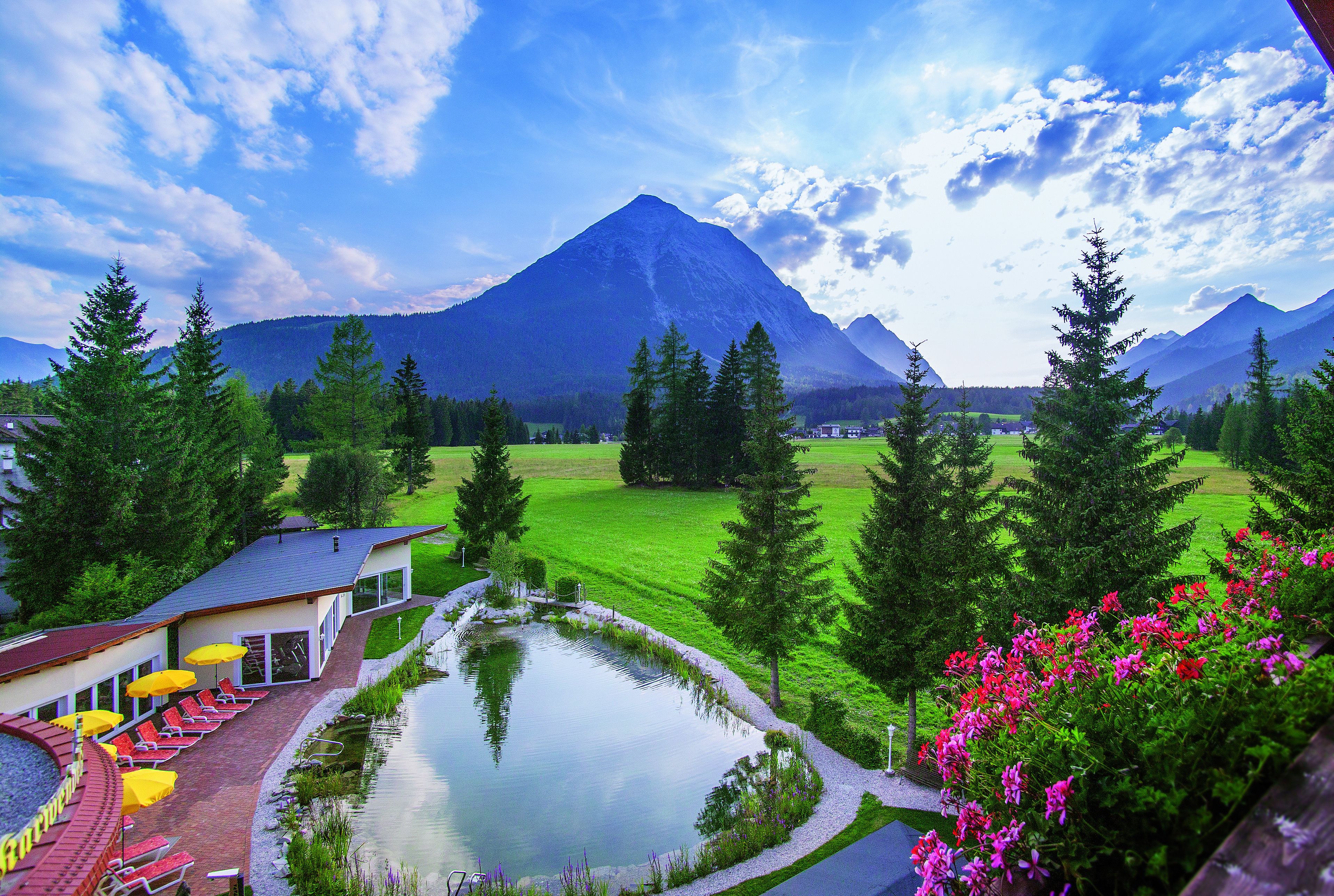 Indoor pool, 2 outdoor pools, open 7:00 AM to 8:00 PM, pool umbrellas