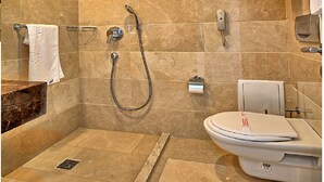 A modern bathroom with a shower, toilet, and vanity. - Samir Deluxe Hotel (Istanbul)