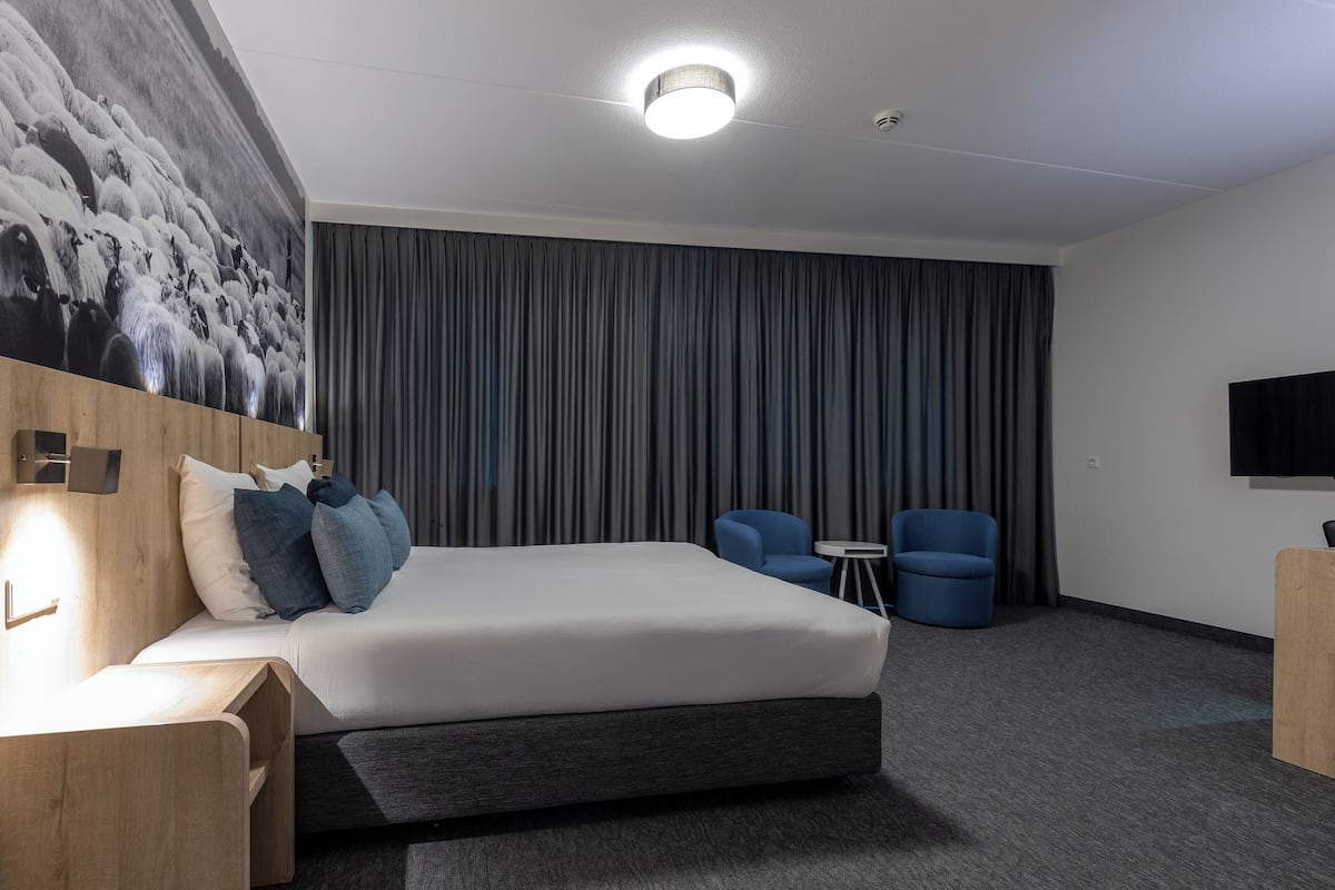 In-room safe, desk, blackout curtains, iron/ironing board