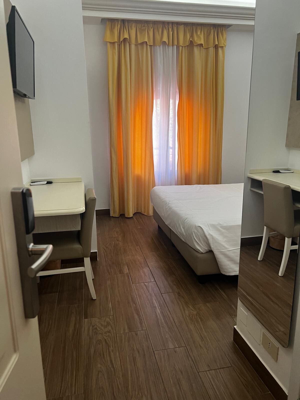 economy double or twin room, 1 double or 2 single beds | minibar, desk, iron/ironing board, cots/infant beds