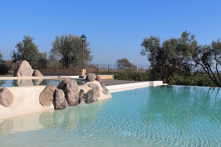 2 outdoor pools, pool umbrellas, sun loungers