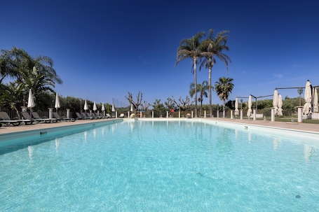 2 outdoor pools, pool umbrellas, sun loungers