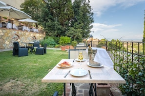 Lunch, dinner served; local cuisine, garden views