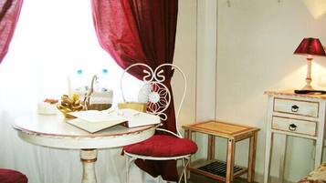 Double Room Single Use | Living area | Flat-screen TV