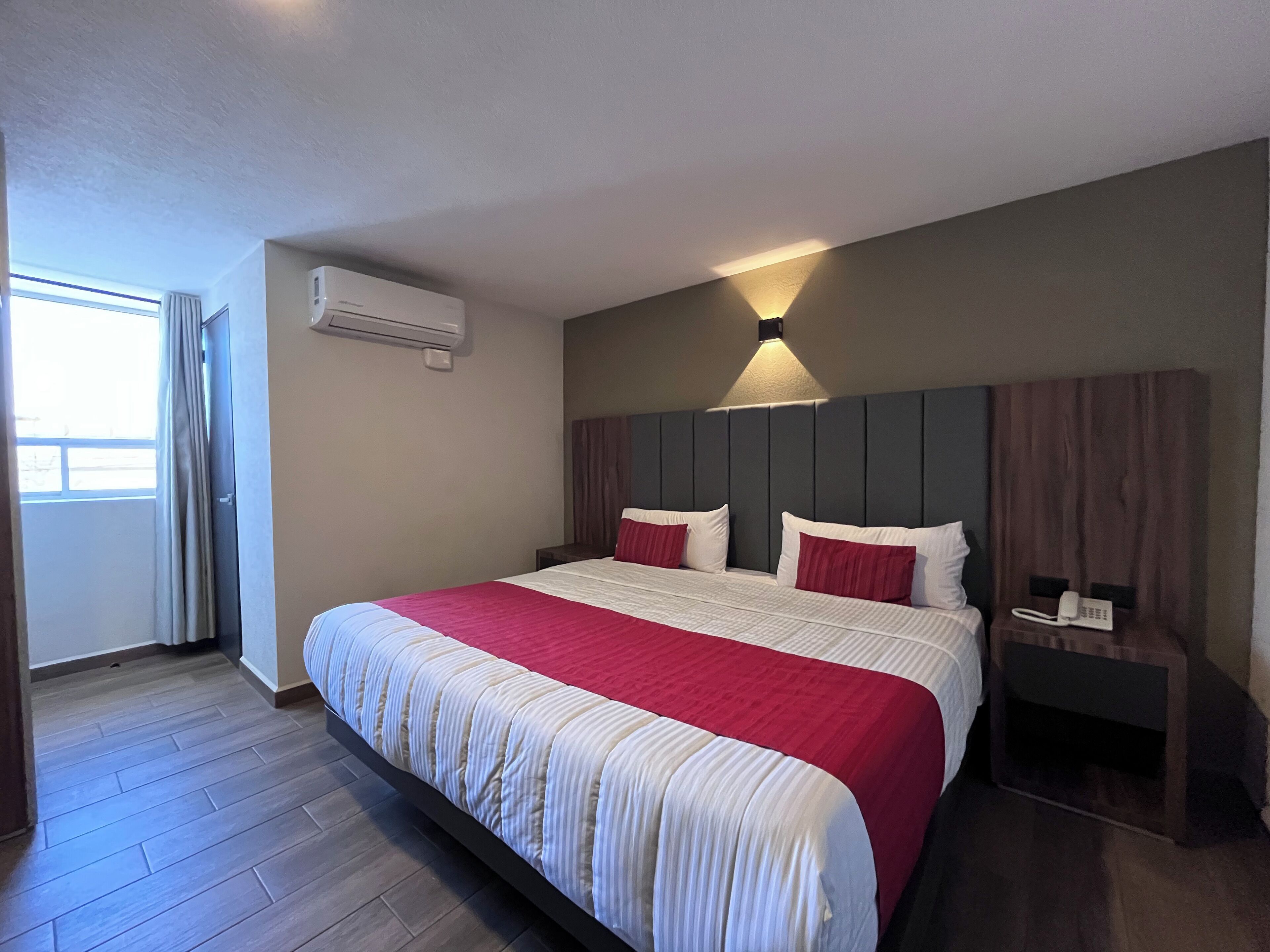 Deluxe Room, 1 King Bed | Desk, laptop workspace, free WiFi, bed sheets