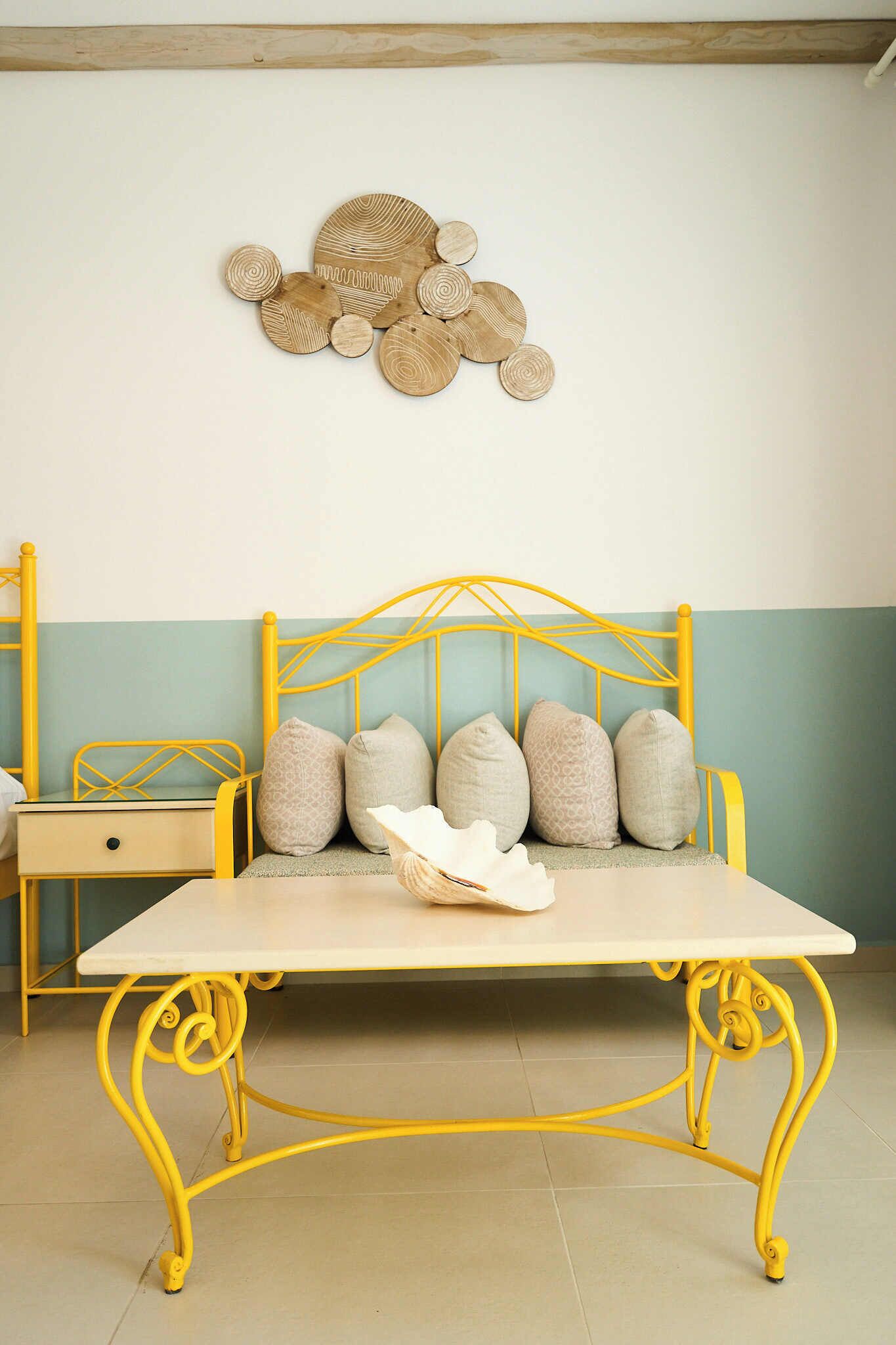 superior triple room with pool view | living area | flat-screen tv