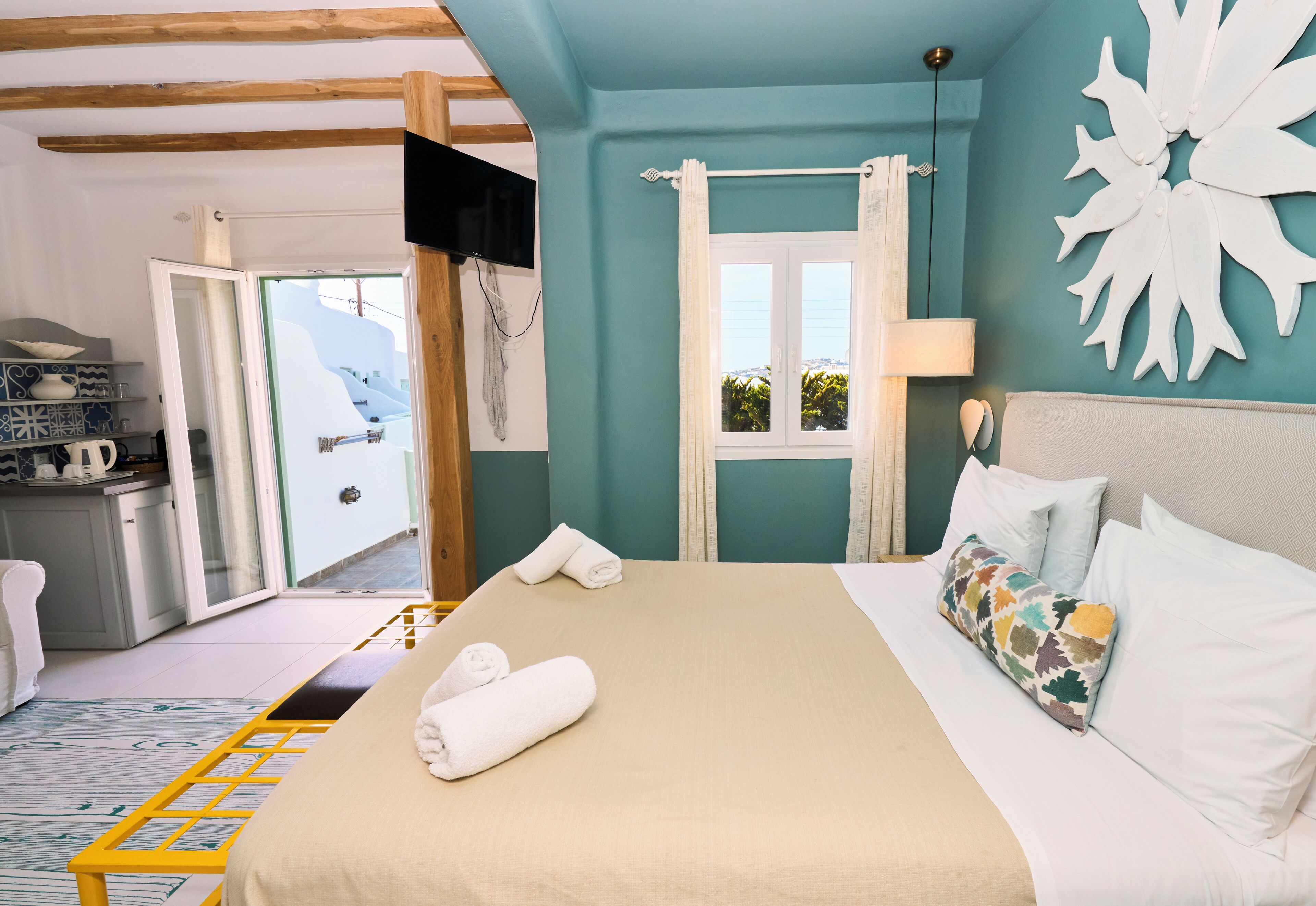 superior room, partial sea view | hypo-allergenic bedding, down duvets, in-room safe, iron/ironing board