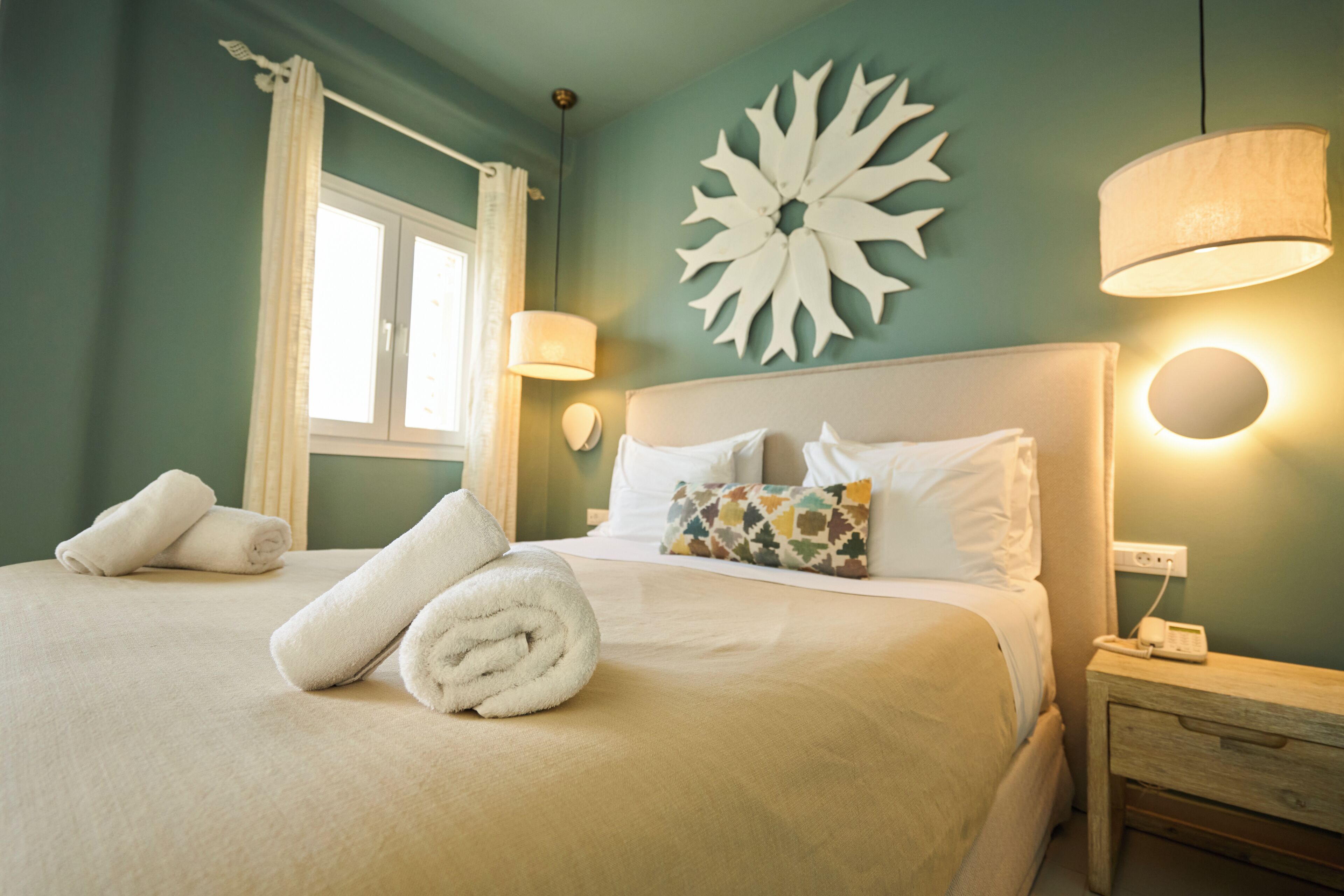 superior room, partial sea view | hypo-allergenic bedding, down duvets, in-room safe, iron/ironing board