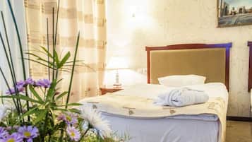 Standard Double or Twin Room | Minibar, in-room safe, desk, blackout drapes