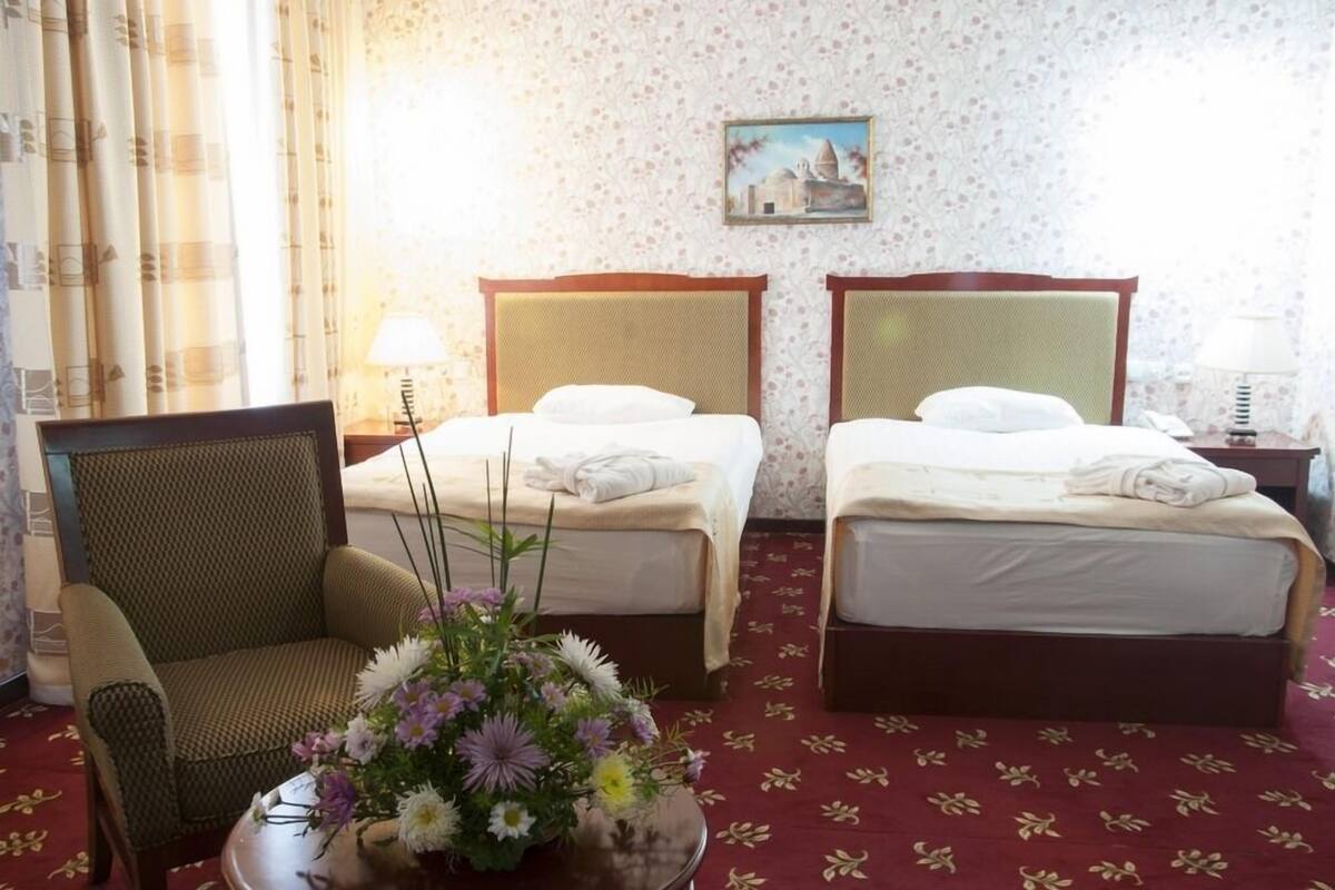 Premium Twin Room | Minibar, in-room safe, desk, blackout drapes