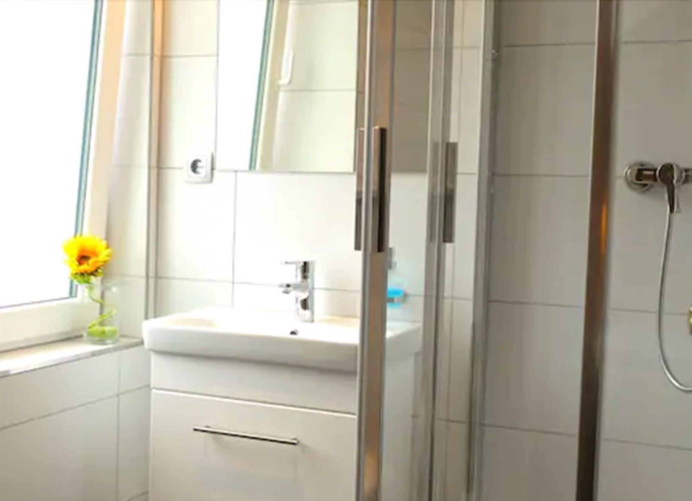 shower, hair dryer, heated floors, towels