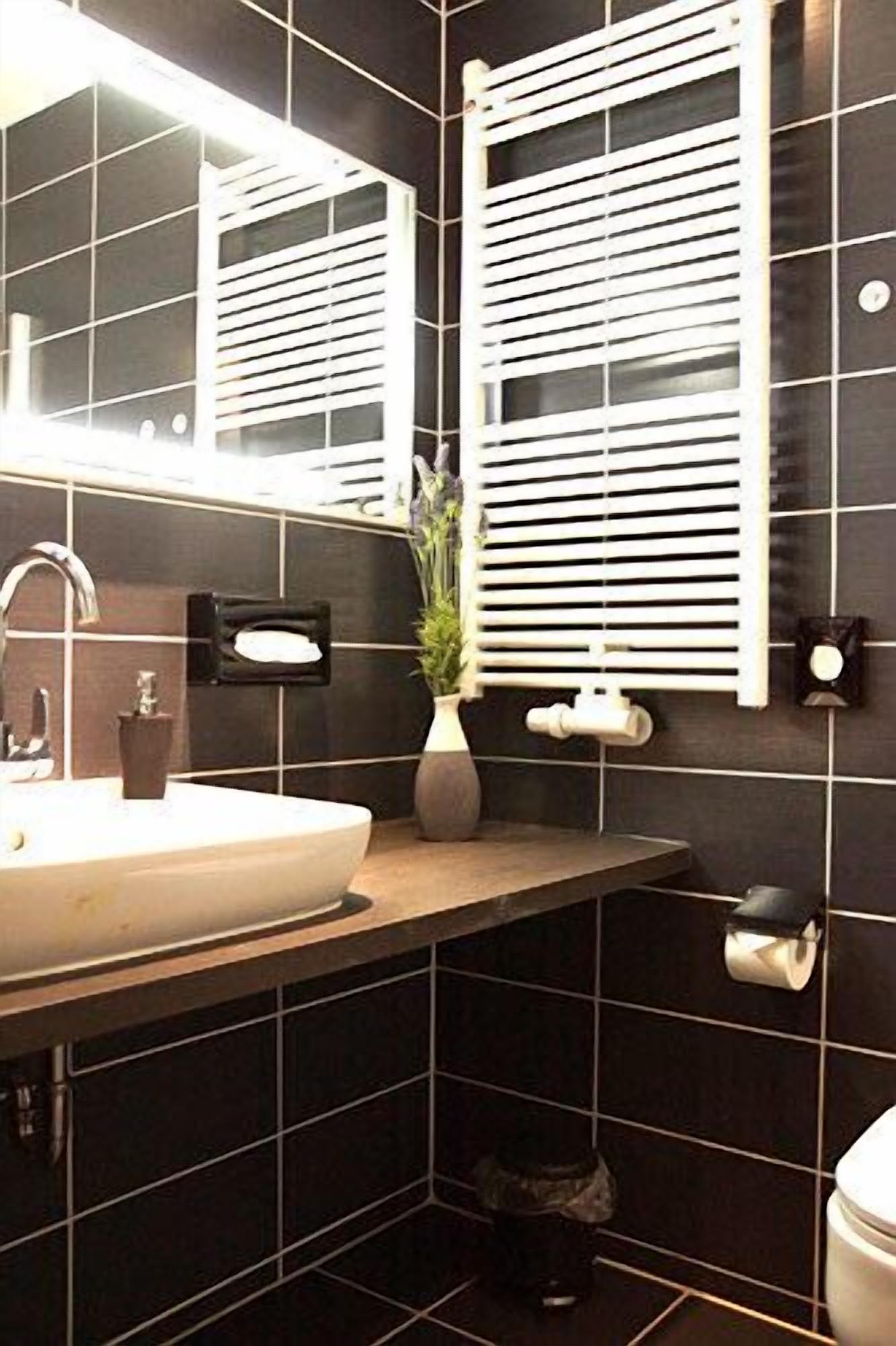 shower, rainfall showerhead, hair dryer, towels