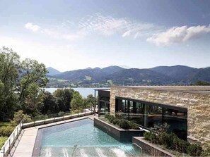 Indoor pool, outdoor pool, open 7:00 AM to 9:00 PM, pool loungers