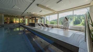 Indoor pool, open 8:00 AM to 9:30 PM, pool loungers