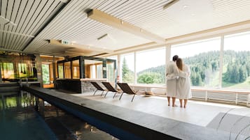 Indoor pool, open 8:00 AM to 9:30 PM, pool loungers