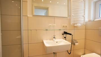 Shower, free toiletries, hair dryer, towels