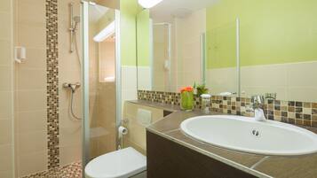 Shower, free toiletries, hair dryer, towels