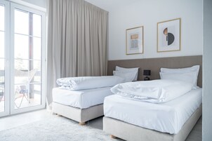 Standard-Zweibettzimmer, 2 Einzelbetten, Nichtraucher | Zimmersafe, individuell dekoriert, individuell eingerichtet