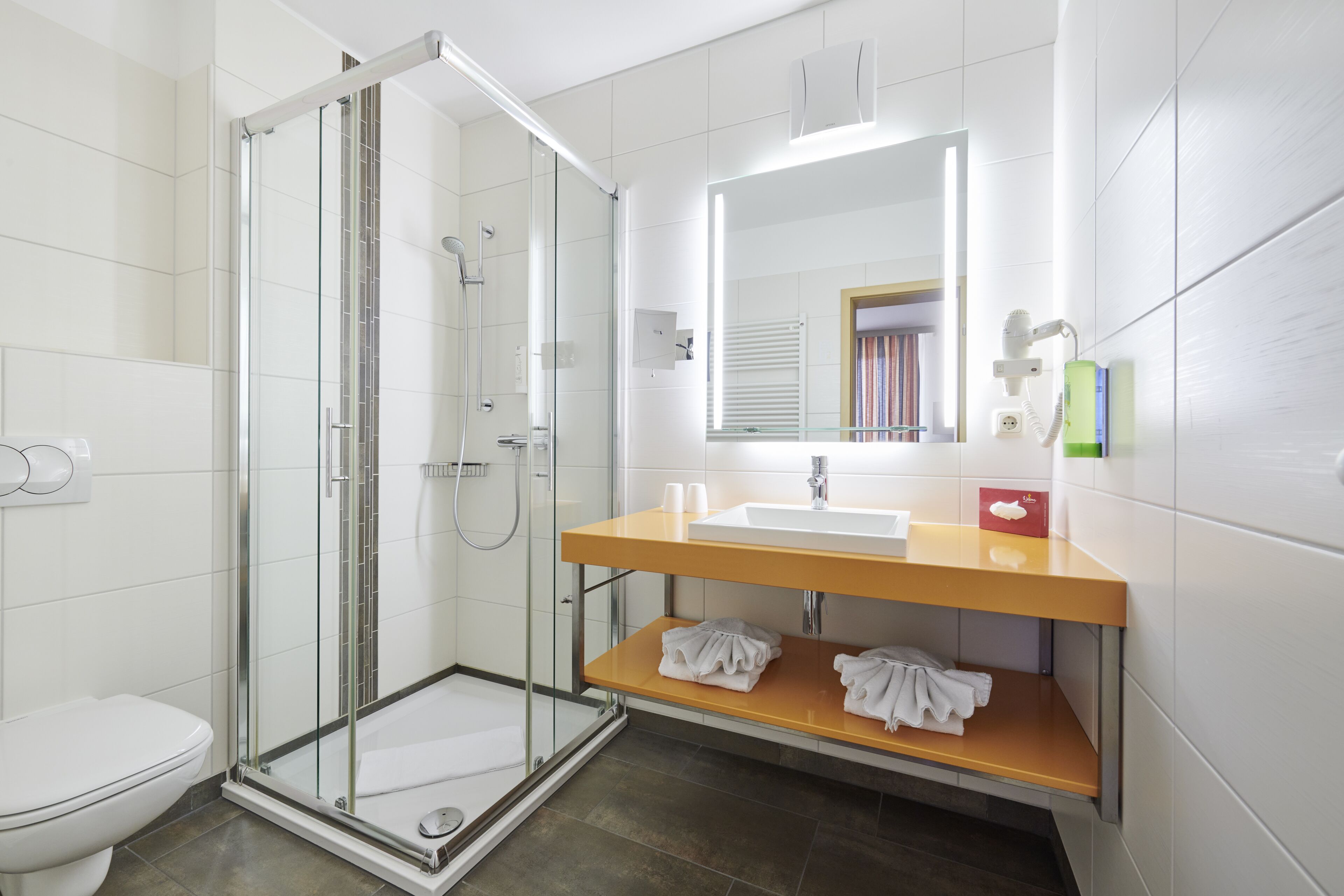 superior room | bathroom | shower, hair dryer, towels