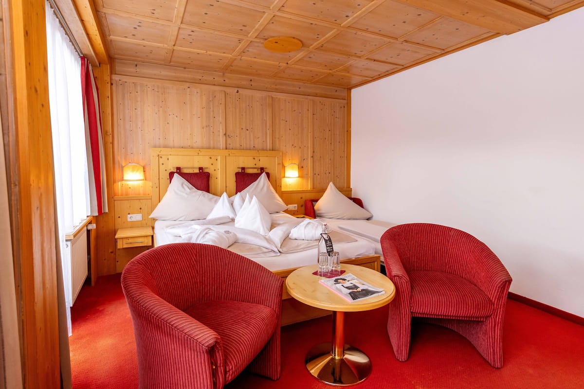 Comfort tweepersoonskamer | 1 slaapkamer, een kluis op de kamer, een strijkplank/strijkijzer