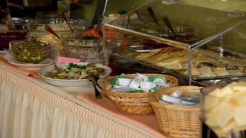 A buffet with various food items and containers.