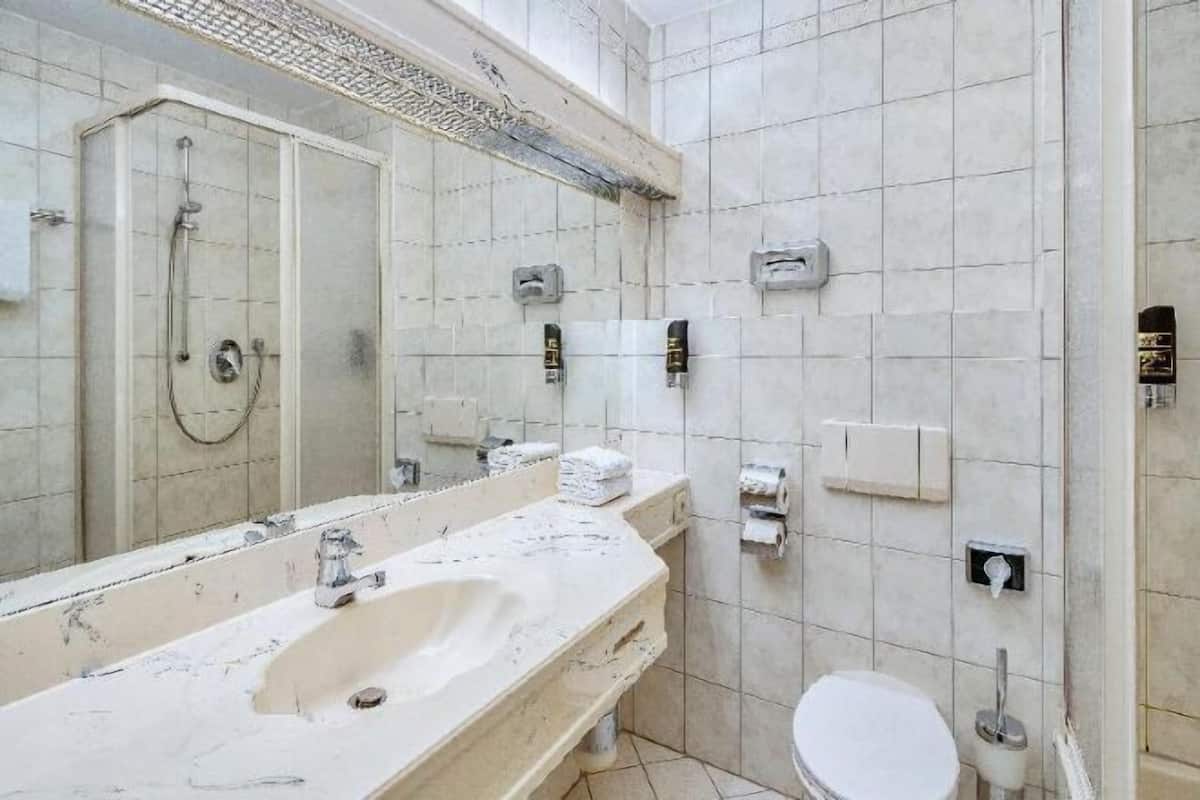 Bathroom | Shower, free toiletries, bathrobes, towels