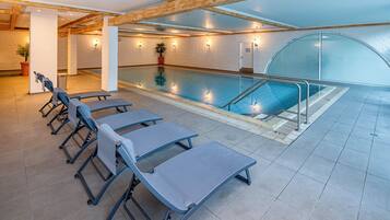 Indoor pool, open 7 AM to 8:30 PM, pool loungers