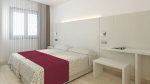 Un dormitorio moderno con cama, mesita de noche y ventana con cortinas.