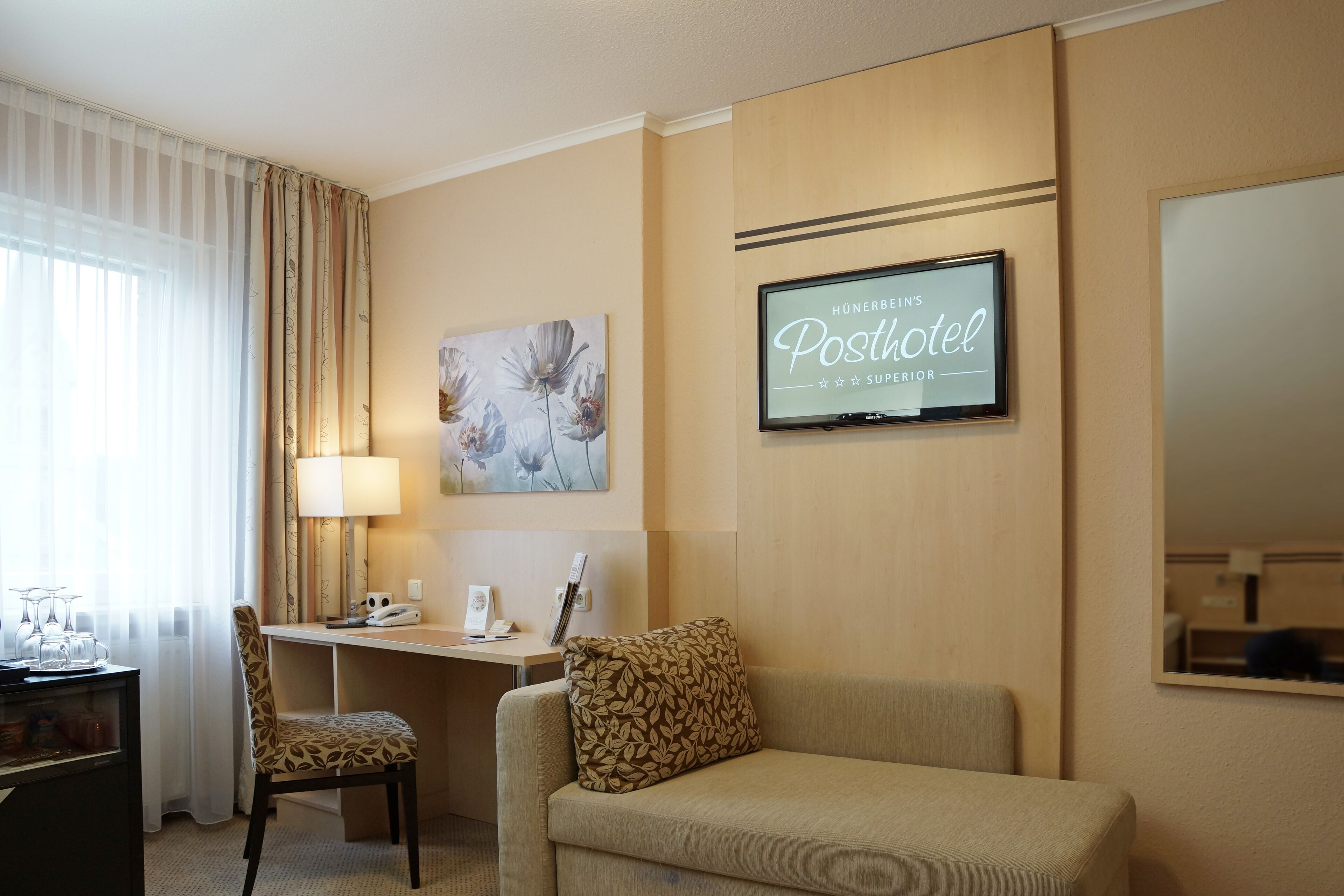 standard single room | living area | 30-inch flat-screen tv with cable channels, tablet