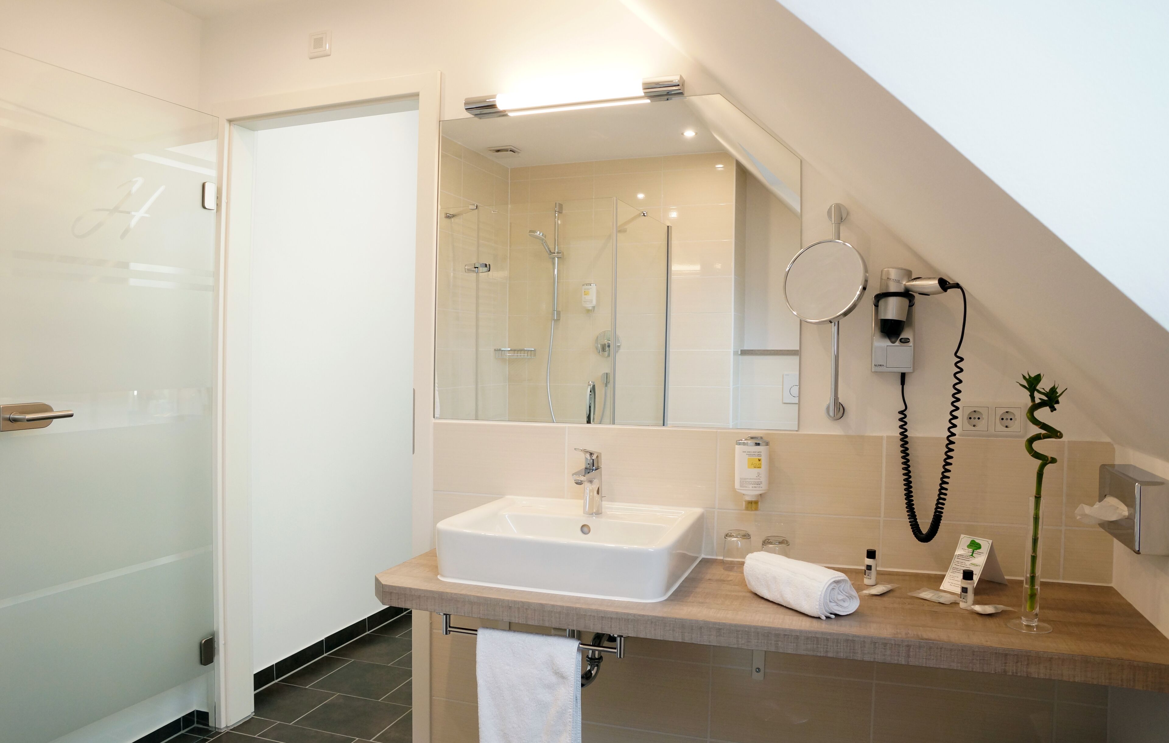 comfort studio | bathroom | shower, designer toiletries, hair dryer, bathrobes