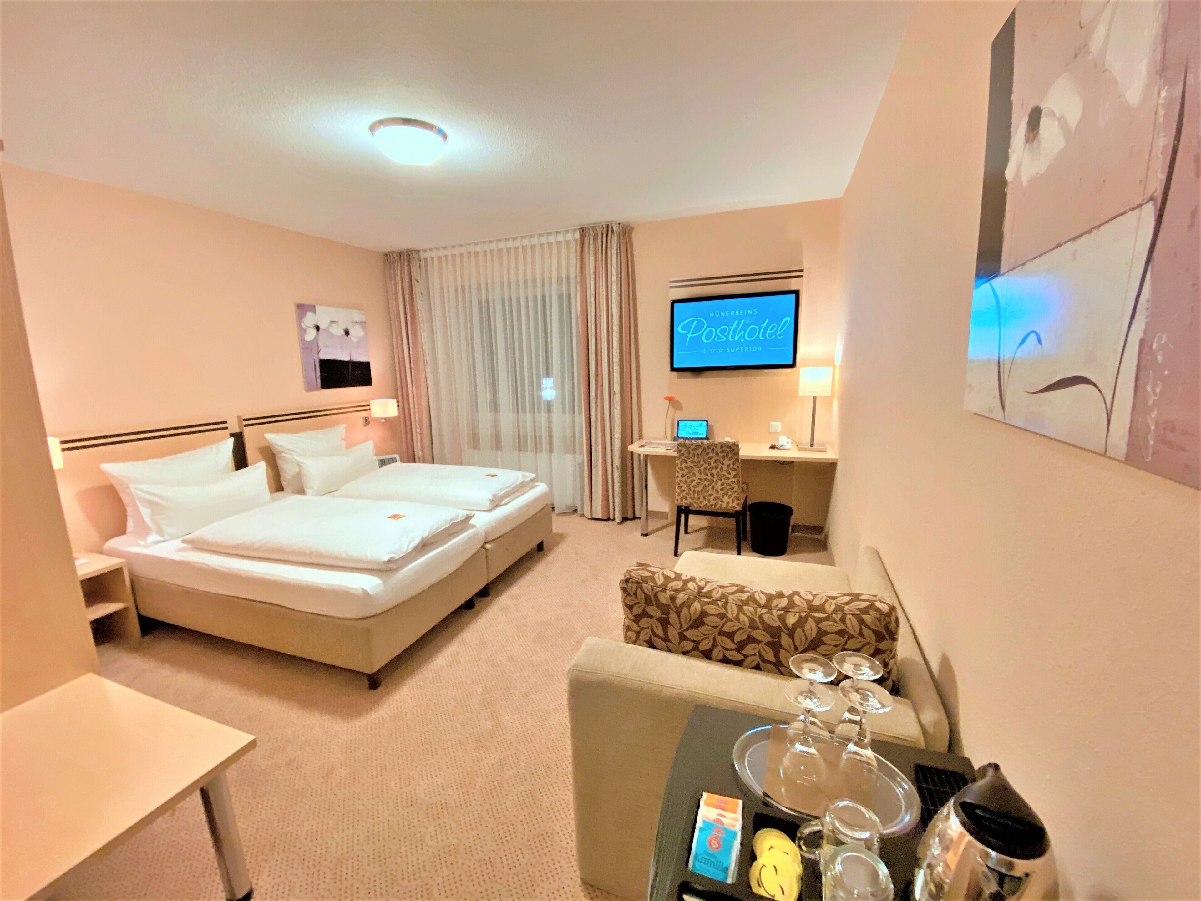 comfort double room | living area | 30-inch flat-screen tv with cable channels, tablet