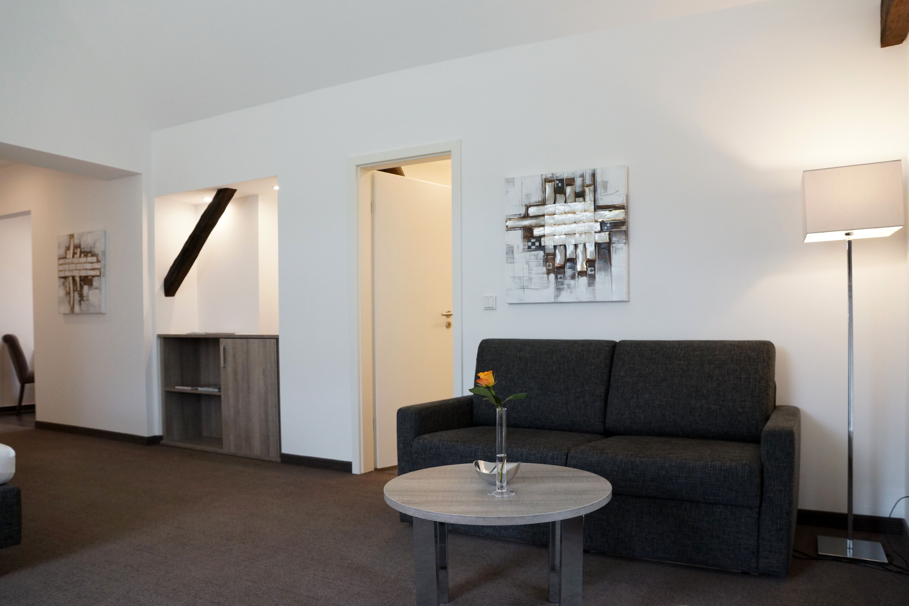 deluxe studio | living area | 30-inch flat-screen tv with cable channels, tablet