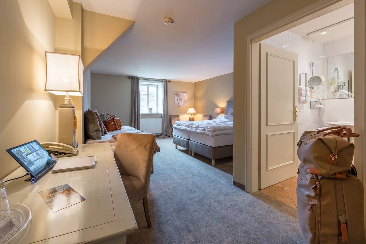 comfort triple room | living area | 32-inch flat-screen tv with cable channels, tv