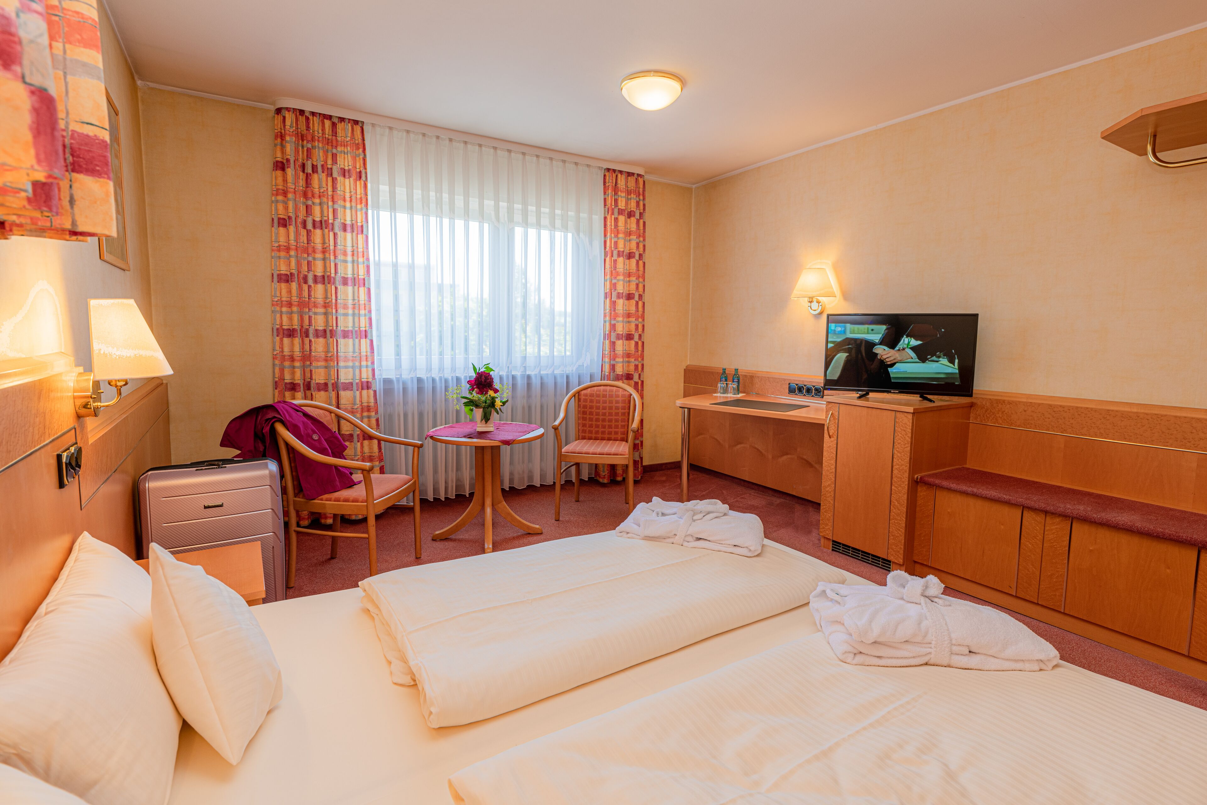 standard double or twin room | in-room safe, desk, iron/ironing board, rollaway beds