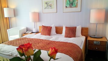 Couette en duvet d'oie, minibar, coffres-forts dans les chambres